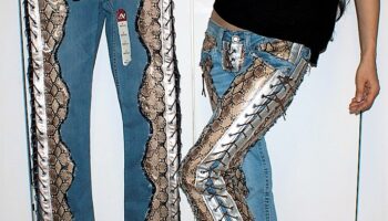 Denim Jeans with lace-up sides and realistic Snakeskin pattern with dark denim trim and silver lining.  "SNAKE CHARMER"